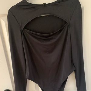 Black bodysuit from H&M. In size large. Going out top.